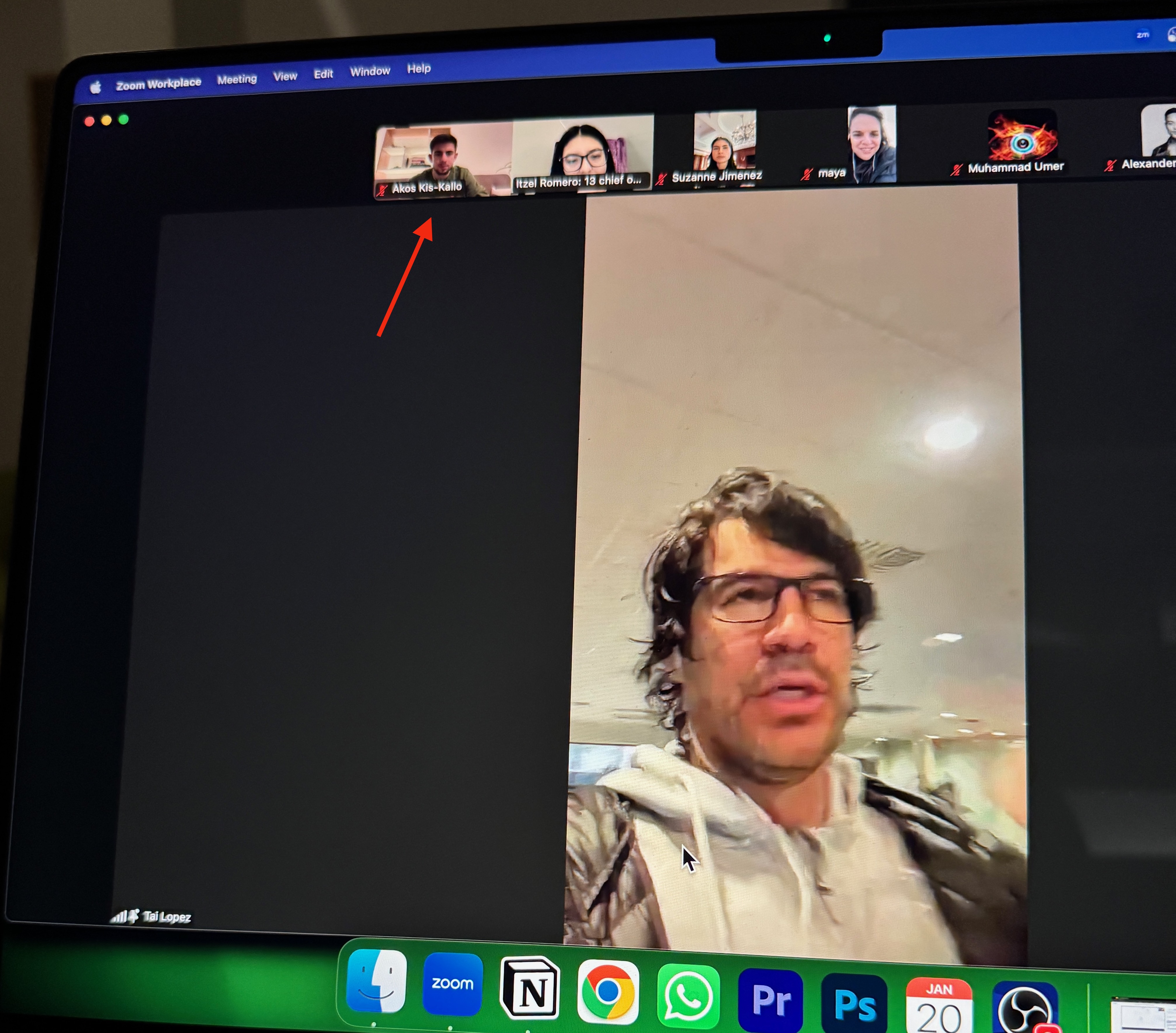 Photo of a Zoom group call with an arrow pointing to Ákos Kis-Kalló among the participants and the speaker labelled Tai Lopez
